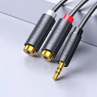 Ugreen audio adapteris jack 3.5mm spraudnis uz 2xRCA ligzdu kabelis 0.25m pelēks (AV109)