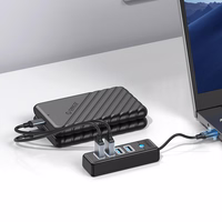 Orico PW4U-C3 USB-C / 4x USB-A 3.0 Hub - melns