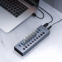 Orico BT2U3-10AB Centrālais mezgls 10x USB-A 3.0 ar slēdžiem - pelēks