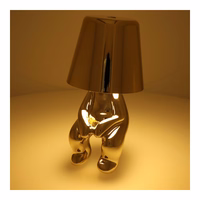 Galda lampa pie gultas GOLD MAN Art Deco sēdoša (versija 2) MLTL