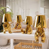 Nakts lampa Golden Man dizains D