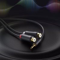 Ugreen audio adapteris jack 3.5mm spraudnis uz 2xRCA ligzdu kabelis 0.25m pelēks (AV109)